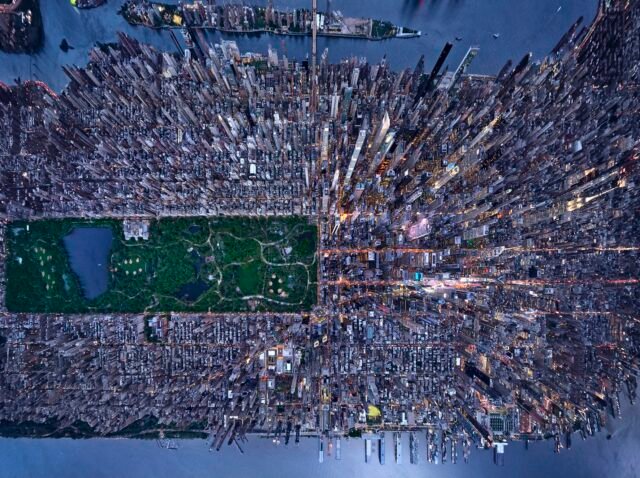 Vertical aerial image of Manhattan at night